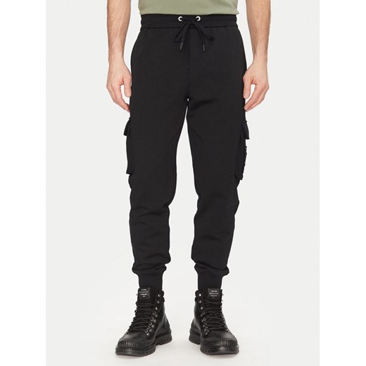 Moose Knuckles Spodnie dresowe Hartsfield M33MR777 Czarny Regular Fit ze sklepu MODIVO w kategorii Spodnie męskie - zdjęcie 182683223