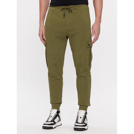 Boss Spodnie dresowe Seteam 50507886 Zielony Relaxed Fit ze sklepu MODIVO w kategorii Spodnie męskie - zdjęcie 182683702