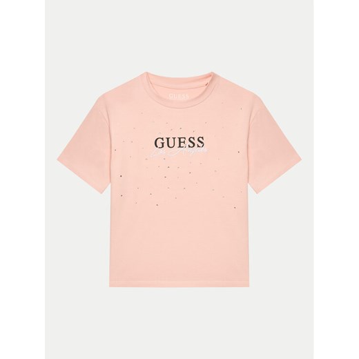 Guess T-Shirt J4YI27 K6YW4 Różowy Boxy Fit ze sklepu MODIVO w kategorii Bluzki dziewczęce - zdjęcie 182684251