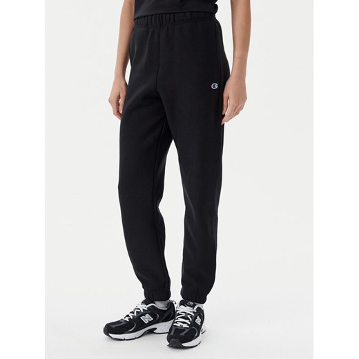 Champion Spodnie dresowe 117872 Czarny Slim Fit ze sklepu MODIVO w kategorii Spodnie damskie - zdjęcie 182684841