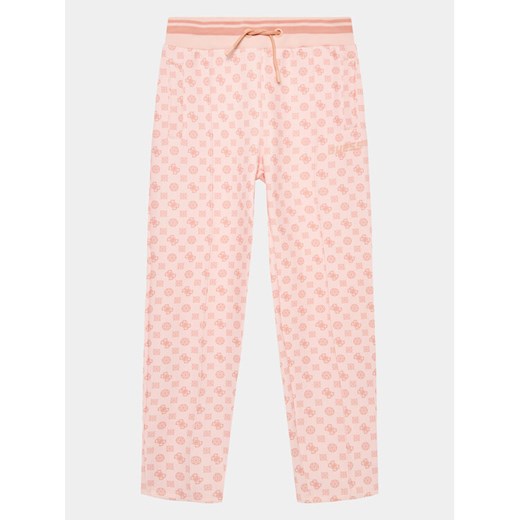 Guess Spodnie dresowe J3YQ16 KB212 Różowy Regular Fit ze sklepu MODIVO w kategorii Spodnie dziewczęce - zdjęcie 182685173