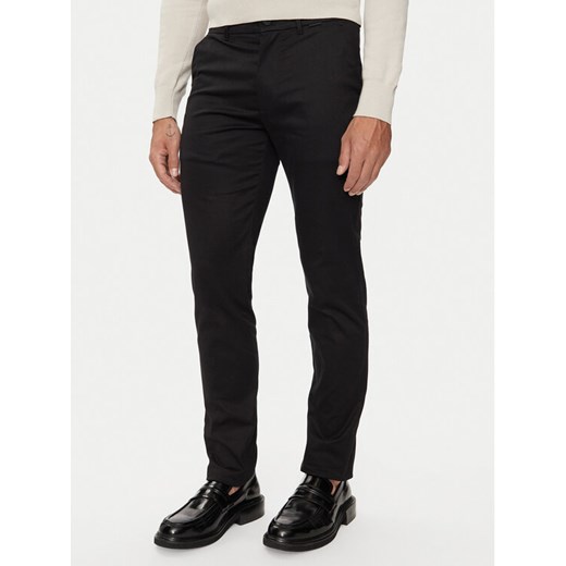 Calvin Klein Chinosy K10K113429 Czarny Slim Fit ze sklepu MODIVO w kategorii Spodnie męskie - zdjęcie 182685270