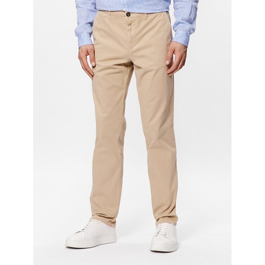 United Colors Of Benetton Spodnie materiałowe 4DKH55I18 Beżowy Slim Fit ze sklepu MODIVO w kategorii Spodnie męskie - zdjęcie 182686081