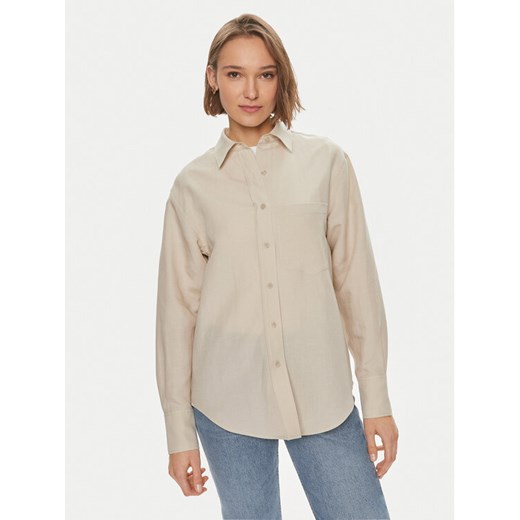 Calvin Klein Koszula K20K206694 Beżowy Relaxed Fit ze sklepu MODIVO w kategorii Koszule damskie - zdjęcie 182686102