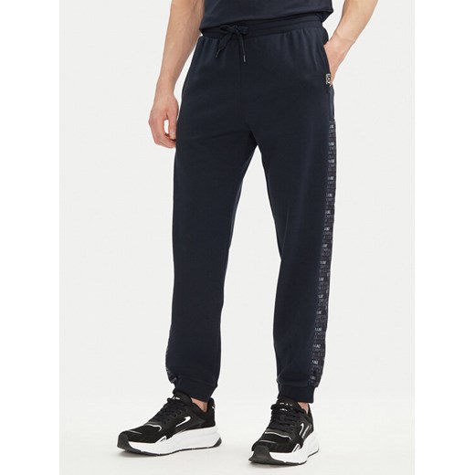 EA7 Emporio Armani Spodnie dresowe 7M000216 AF12660 UB102 Granatowy Regular Fit ze sklepu MODIVO w kategorii Spodnie męskie - zdjęcie 182686522