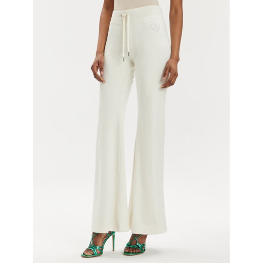 Juicy Couture Spodnie dresowe Rodeo Layla JCBBJ223823 Écru Regular Fit ze sklepu MODIVO w kategorii Spodnie damskie - zdjęcie 182688271