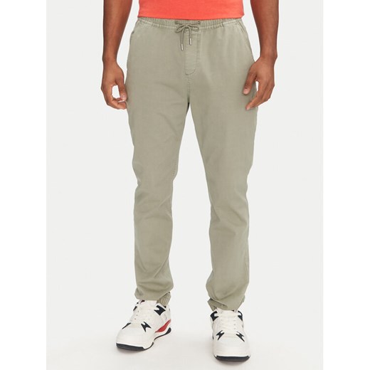 Tommy Jeans Joggery Austin DM0DM20283 Zielony Slim Fit ze sklepu MODIVO w kategorii Spodnie męskie - zdjęcie 182688313