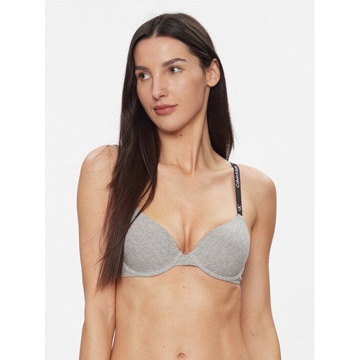 Calvin Klein Underwear Biustonosz z fiszbiną Lightly Lined Demi 000QF7219E Szary ze sklepu MODIVO w kategorii Biustonosze - zdjęcie 182688474