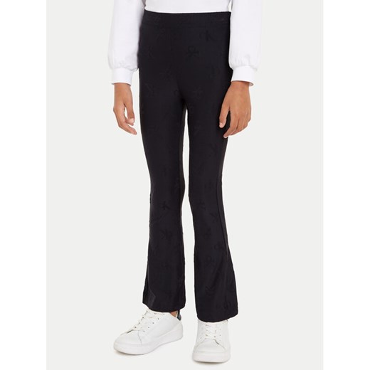 Calvin Klein Jeans Legginsy IG0IG02689 Czarny Flare Fit ze sklepu MODIVO w kategorii Spodnie dziewczęce - zdjęcie 182689504