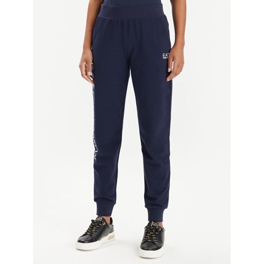 EA7 Emporio Armani Spodnie dresowe 8NTP85 TJTXZ 1554 Granatowy Regular Fit ze sklepu MODIVO w kategorii Spodnie damskie - zdjęcie 182690184