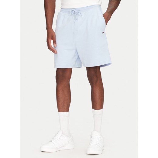 Tommy Jeans Szorty sportowe Entry GraphicDM0DM21369 Błękitny Regular Fit ze sklepu MODIVO w kategorii Spodenki męskie - zdjęcie 182690730