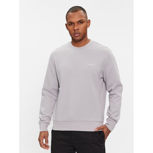 Calvin Klein Bluza Micro Logo K10K109926 Szary Regular Fit ze sklepu MODIVO w kategorii Bluzy męskie - zdjęcie 182690870