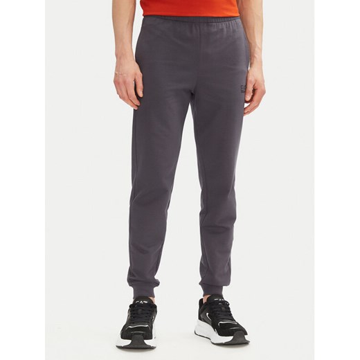 EA7 Emporio Armani Spodnie dresowe 8NPP66 PJVRZ U8115 Szary Slim Fit ze sklepu MODIVO w kategorii Spodnie męskie - zdjęcie 182691550