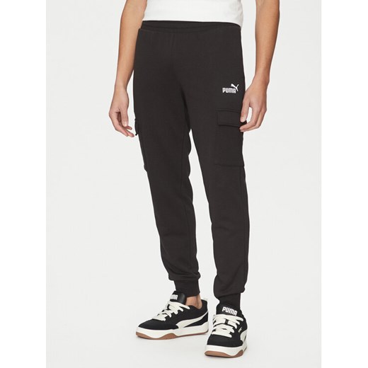 Puma Spodnie dresowe Ess No. 1 Logo Cargo 682661 Czarny Regular Fit ze sklepu MODIVO w kategorii Spodnie męskie - zdjęcie 182691783