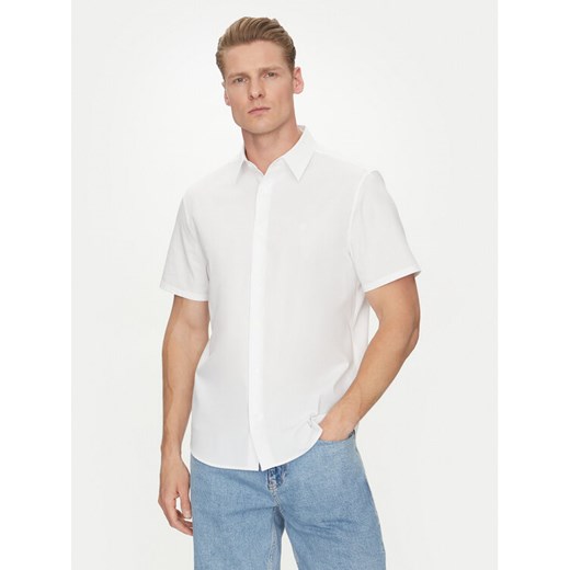 Calvin Klein Koszula Classic LV04LB125G Biały Regular Fit ze sklepu MODIVO w kategorii Koszule męskie - zdjęcie 182692500