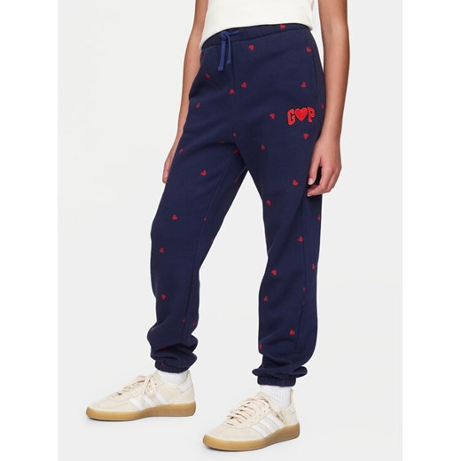Gap Spodnie dresowe 645537-00 Granatowy Regular Fit ze sklepu MODIVO w kategorii Spodnie chłopięce - zdjęcie 182692540