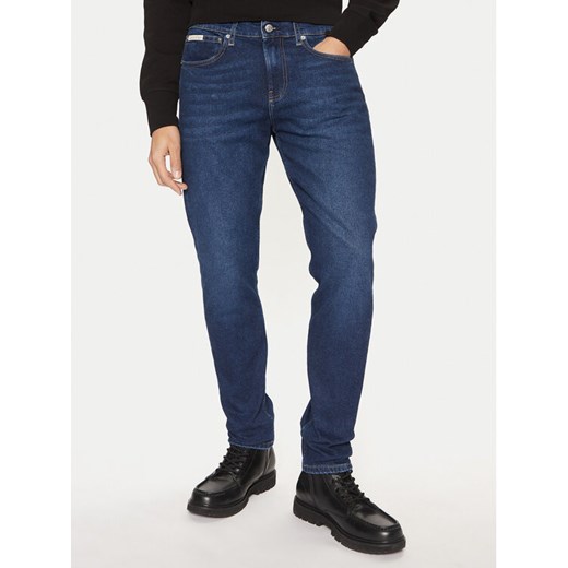 Calvin Klein Jeans Jeansy J30J327007 Granatowy Slim Fit ze sklepu MODIVO w kategorii Jeansy męskie - zdjęcie 182692584