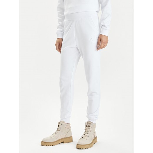 Armani Exchange Spodnie dresowe 3DYP82 YJFDZ 1000 Biały Regular Fit ze sklepu MODIVO w kategorii Spodnie damskie - zdjęcie 182693154