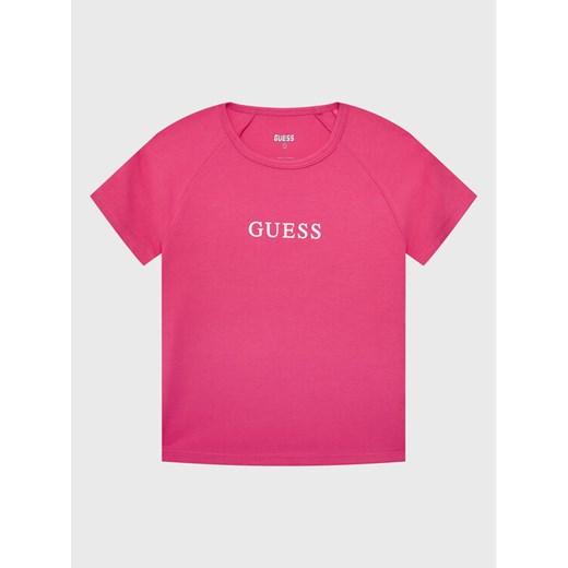 Guess T-Shirt J3RI34 KABR0 Różowy Regular Fit ze sklepu MODIVO w kategorii Bluzki dziewczęce - zdjęcie 182694141