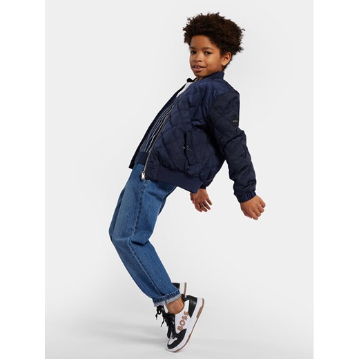 Boss Jeansy J50690 S Niebieski Tapered Fit ze sklepu MODIVO w kategorii Spodnie chłopięce - zdjęcie 182694854