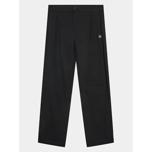 Calvin Klein Jeans Spodnie materiałowe Ceremony IB0IB01936 Czarny Regular Fit ze sklepu MODIVO w kategorii Spodnie chłopięce - zdjęcie 182695151