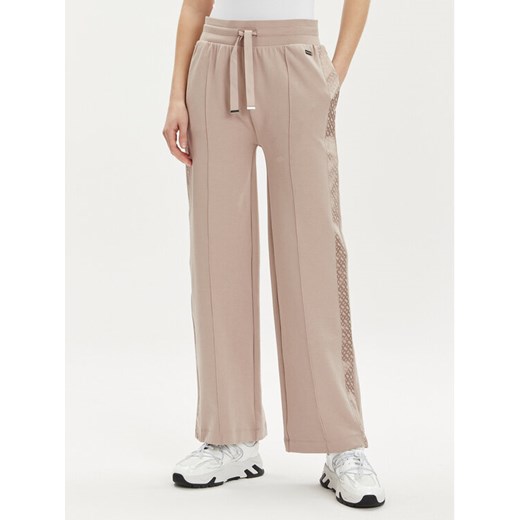 Boss Spodnie dresowe Arya 50515574 Beżowy Regular Fit ze sklepu MODIVO w kategorii Spodnie damskie - zdjęcie 182695414