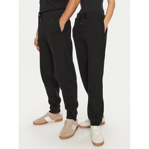 AMI PARIS Spodnie dresowe UTR237.749 Czarny Relaxed Fit ze sklepu MODIVO w kategorii Spodnie damskie - zdjęcie 182697452