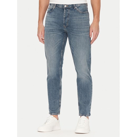 HUGO Jeansy 50537705 Niebieski Tapered Fit ze sklepu MODIVO w kategorii Jeansy męskie - zdjęcie 182697713