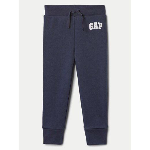 Gap Spodnie dresowe 633913-15 Granatowy Regular Fit ze sklepu MODIVO w kategorii Spodnie chłopięce - zdjęcie 182698264