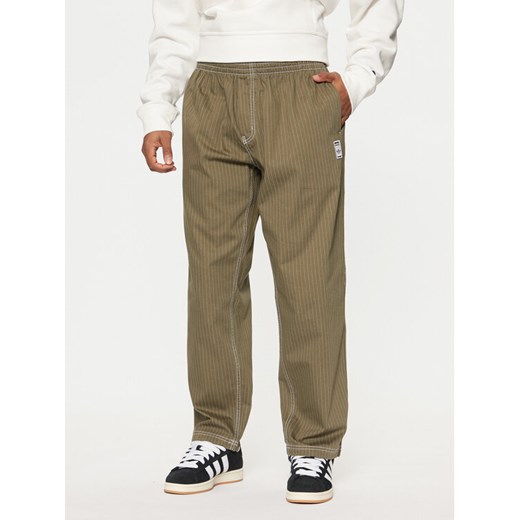 adidas Spodnie dresowe JP4488 Zielony Loose Fit ze sklepu MODIVO w kategorii Spodnie męskie - zdjęcie 182698364