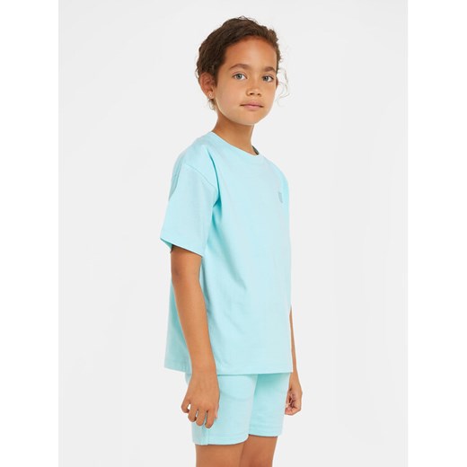 Calvin Klein Jeans T-Shirt Mono Mini Badge IU0IU00580 D Niebieski Regular Fit ze sklepu MODIVO w kategorii T-shirty chłopięce - zdjęcie 182698712