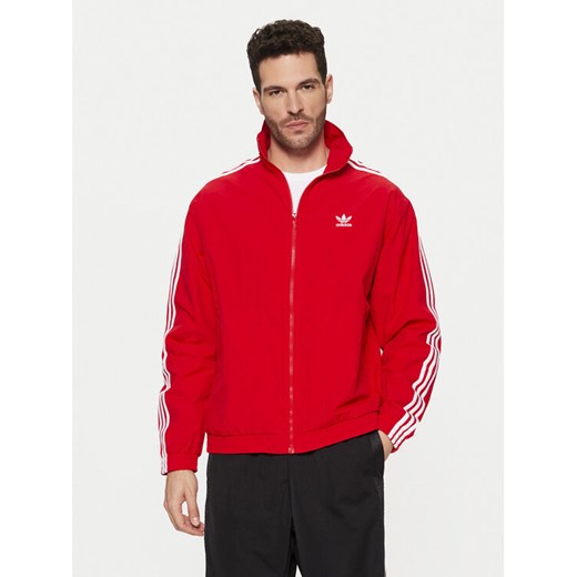 adidas Bluza adicolor Firebird IT2495 Czerwony Loose Fit ze sklepu MODIVO w kategorii Bluzy męskie - zdjęcie 182699041