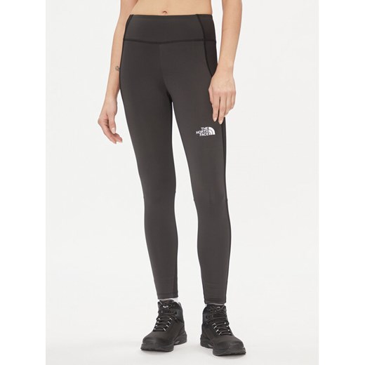 The North Face Legginsy Ma NF0A856I Szary Slim Fit ze sklepu MODIVO w kategorii Spodnie damskie - zdjęcie 182700333