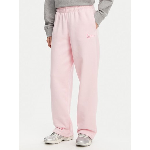 Karl Kani Spodnie dresowe Signature Os 61030060 Różowy Relaxed Fit ze sklepu MODIVO w kategorii Spodnie damskie - zdjęcie 182700410