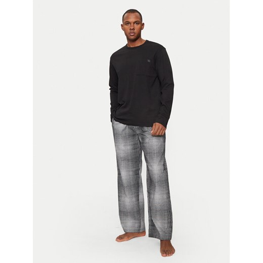 Calvin Klein Underwear Spodnie piżamowe 000NM2842E Szary Relaxed Fit ze sklepu MODIVO w kategorii Piżamy męskie - zdjęcie 182700912