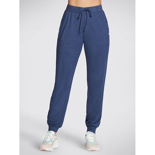 Skechers Spodnie dresowe Godri Swift Jogger WPT254 Niebieski Regular Fit ze sklepu MODIVO w kategorii Spodnie damskie - zdjęcie 182701262