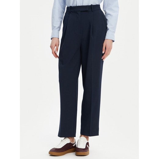 Tommy Hilfiger Chinosy WW0WW44793 Granatowy Tapered Fit ze sklepu MODIVO w kategorii Spodnie damskie - zdjęcie 182703593