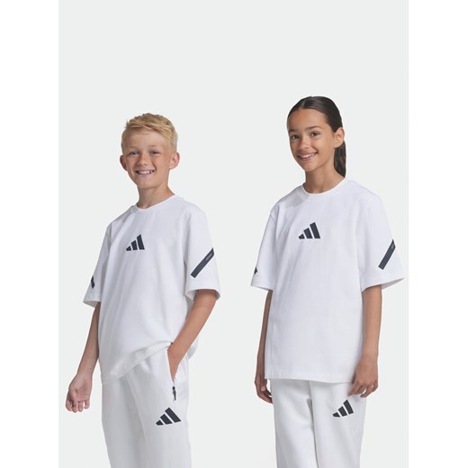 adidas T-Shirt Z.N.E. JJ4144 Biały Loose Fit ze sklepu MODIVO w kategorii Bluzki dziewczęce - zdjęcie 182704102