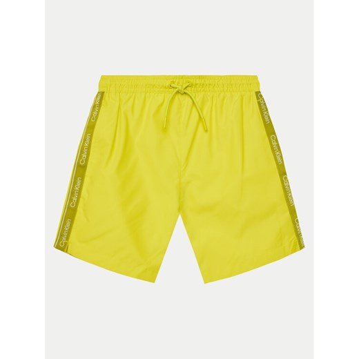 Calvin Klein Swimwear Szorty kąpielowe KV0KV00058 Żółty Regular Fit ze sklepu MODIVO w kategorii Kąpielówki chłopięce - zdjęcie 182704142