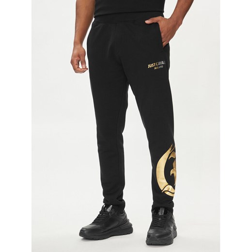 Just Cavalli Spodnie dresowe 76OAAG24 Czarny Regular Fit ze sklepu MODIVO w kategorii Spodnie męskie - zdjęcie 182704164
