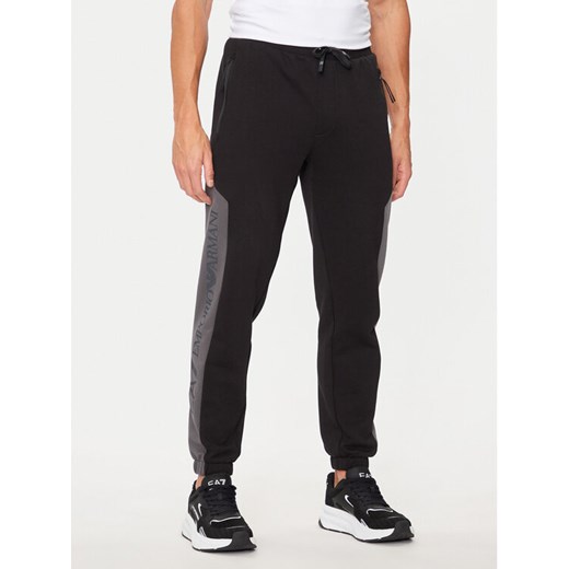 EA7 Emporio Armani Spodnie dresowe 6DPP71 PJVTZ 1200 Czarny Regular Fit ze sklepu MODIVO w kategorii Spodnie męskie - zdjęcie 182704870