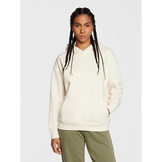 New Balance Bluza Athletics Nature WT23554 Écru Oversize ze sklepu MODIVO w kategorii Bluzy damskie - zdjęcie 182705080