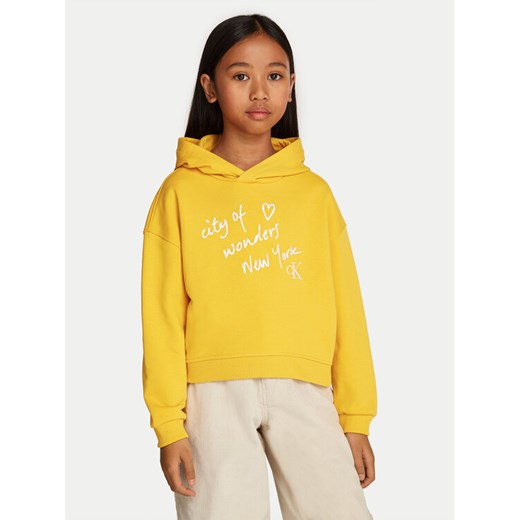 Calvin Klein Jeans Bluza City Graphic IG0IG02645 Żółty Regular Fit ze sklepu MODIVO w kategorii Bluzy dziewczęce - zdjęcie 182705262