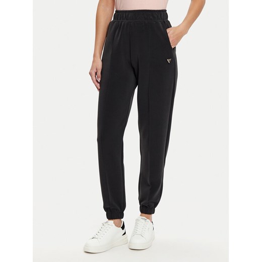 Guess Spodnie dresowe V5RB11 KCAY2 Czarny Regular Fit ze sklepu MODIVO w kategorii Spodnie damskie - zdjęcie 182707571