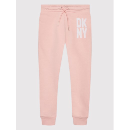 DKNY Spodnie dresowe D34A70 S Różowy Regular Fit ze sklepu MODIVO w kategorii Spodnie dziewczęce - zdjęcie 182708684