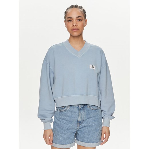Calvin Klein Jeans Bluza J20J223079 Niebieski Relaxed Fit ze sklepu MODIVO w kategorii Bluzy damskie - zdjęcie 182709220