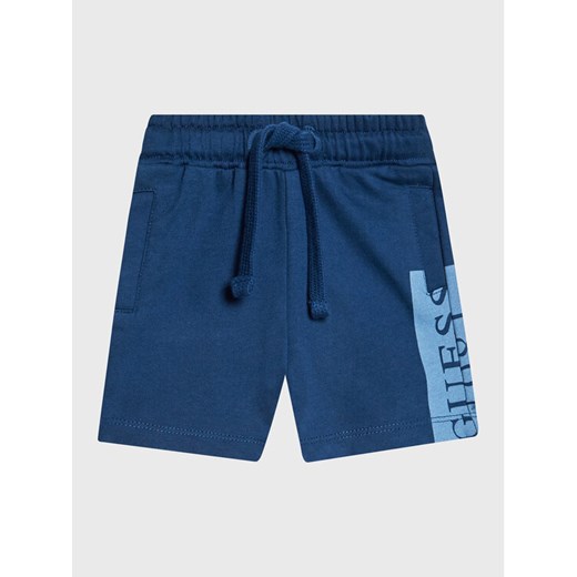 Guess Szorty sportowe N3GD03 KA6R0 Niebieski Relaxed Fit ze sklepu MODIVO w kategorii Spodenki chłopięce - zdjęcie 182712162