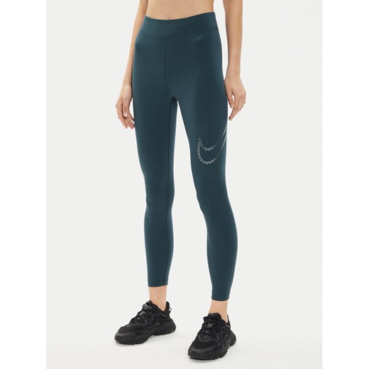 Nike Legginsy FB8766 Zielony Tight Fit ze sklepu MODIVO w kategorii Spodnie damskie - zdjęcie 182712482
