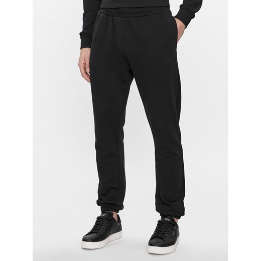 Pepe Jeans Spodnie dresowe Joe Jogger PM211645 Czarny Regular Fit ze sklepu MODIVO w kategorii Spodnie męskie - zdjęcie 182712664
