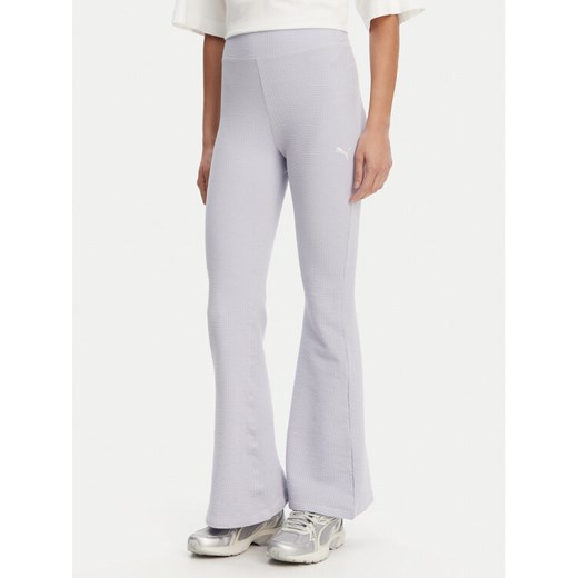 Puma Legginsy Dare To 629809 Fioletowy Slim Fit ze sklepu MODIVO w kategorii Spodnie damskie - zdjęcie 182713241